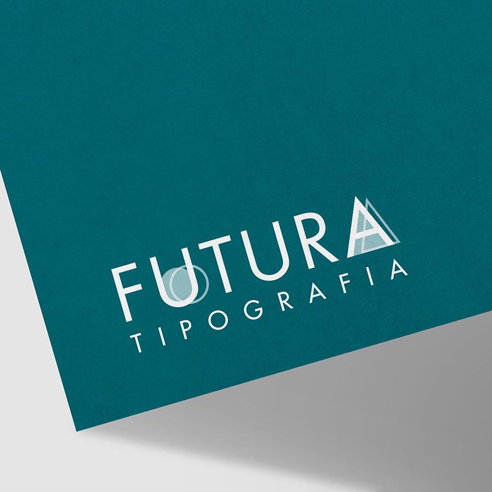 immagine di un cartoncino color ottanio con logo di futura stampato bianco